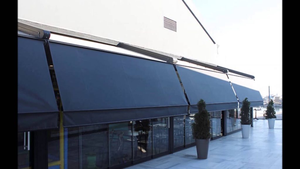 Dış cepheye uygulanan açık bej renkli win tente sistemi